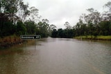 Tableland Road at Essendean Bridge is underwater.