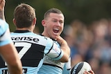 Carney crows after scoring Sharks try