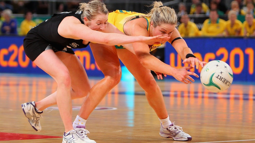 Midcourt battle: Camilla Lees battles with Australia's Julie Corletto for possession.