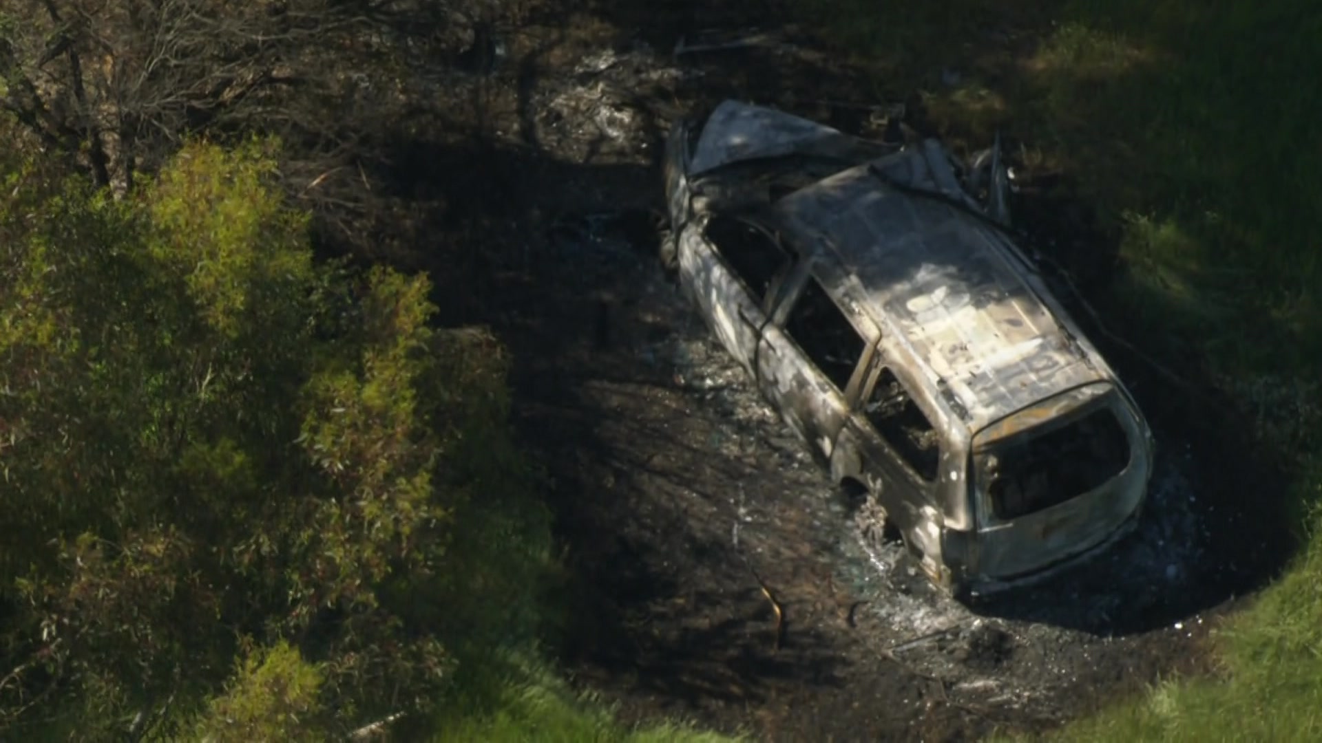 The shell of a car that has burnt up