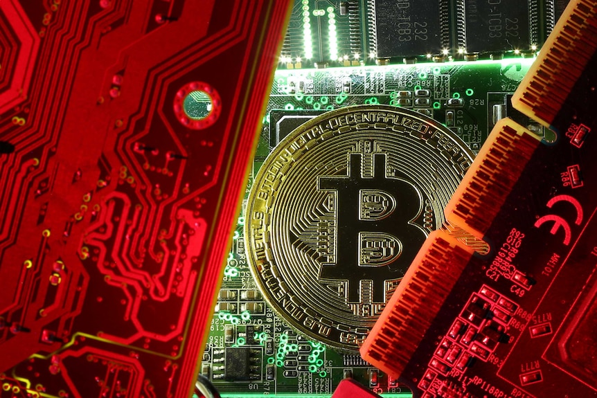 A copy of bitcoin standing on PC motherboard