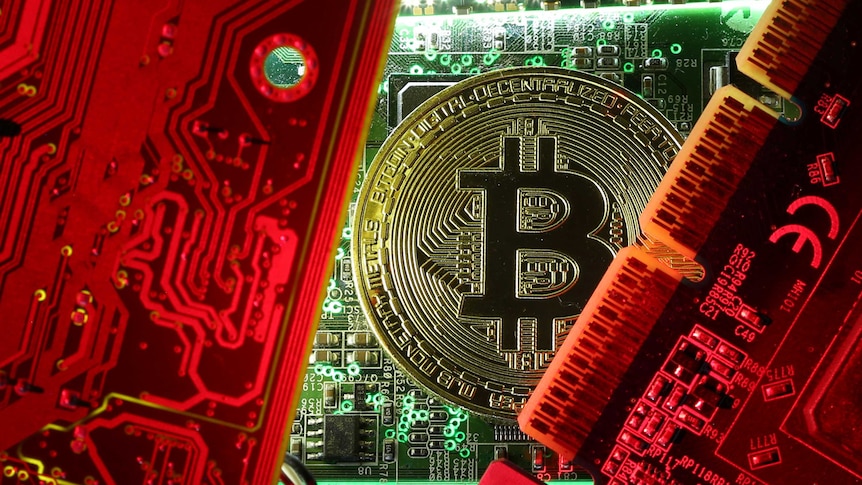 A copy of bitcoin standing on PC motherboard