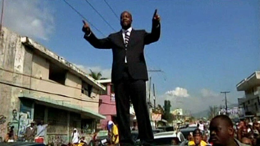 TV STILL of Wyclef Jean after arriving in Haiti to officially launch his bid as president.
