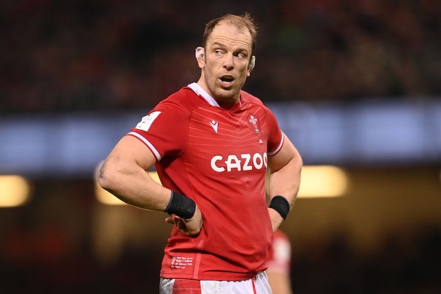 Alun Wyn Jones looks to one side with his hands on his hips