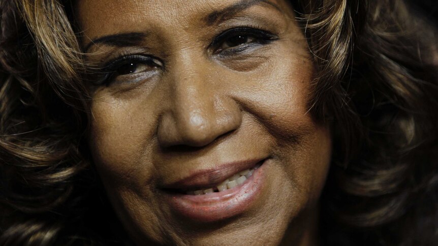 A close up picture of Aretha smiling