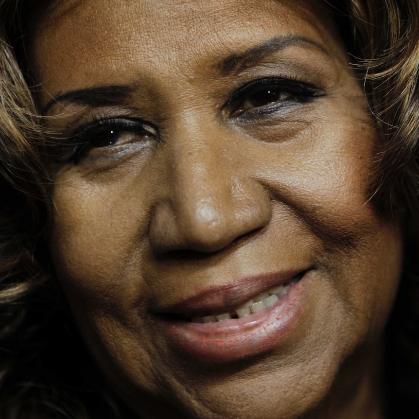 A close up picture of Aretha smiling