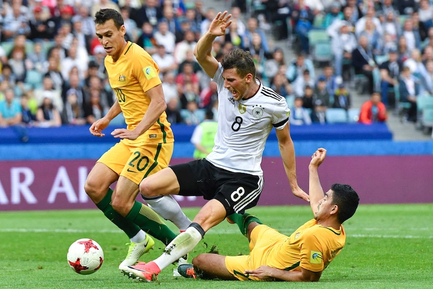 Leon Goretska brought down by Massimo Luongo in Confederations Cup