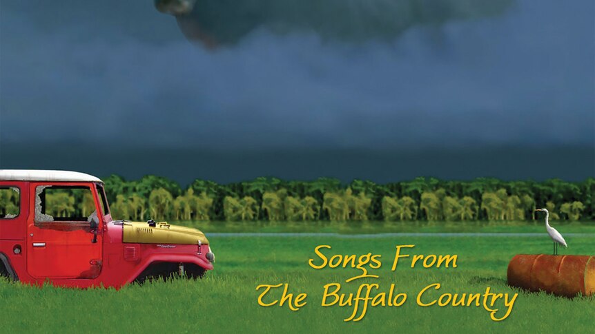 album cover for Mark A Hunter's "Songs from the Buffalo Country". A large buffalo floats in dark stormclouds. Below is a red car