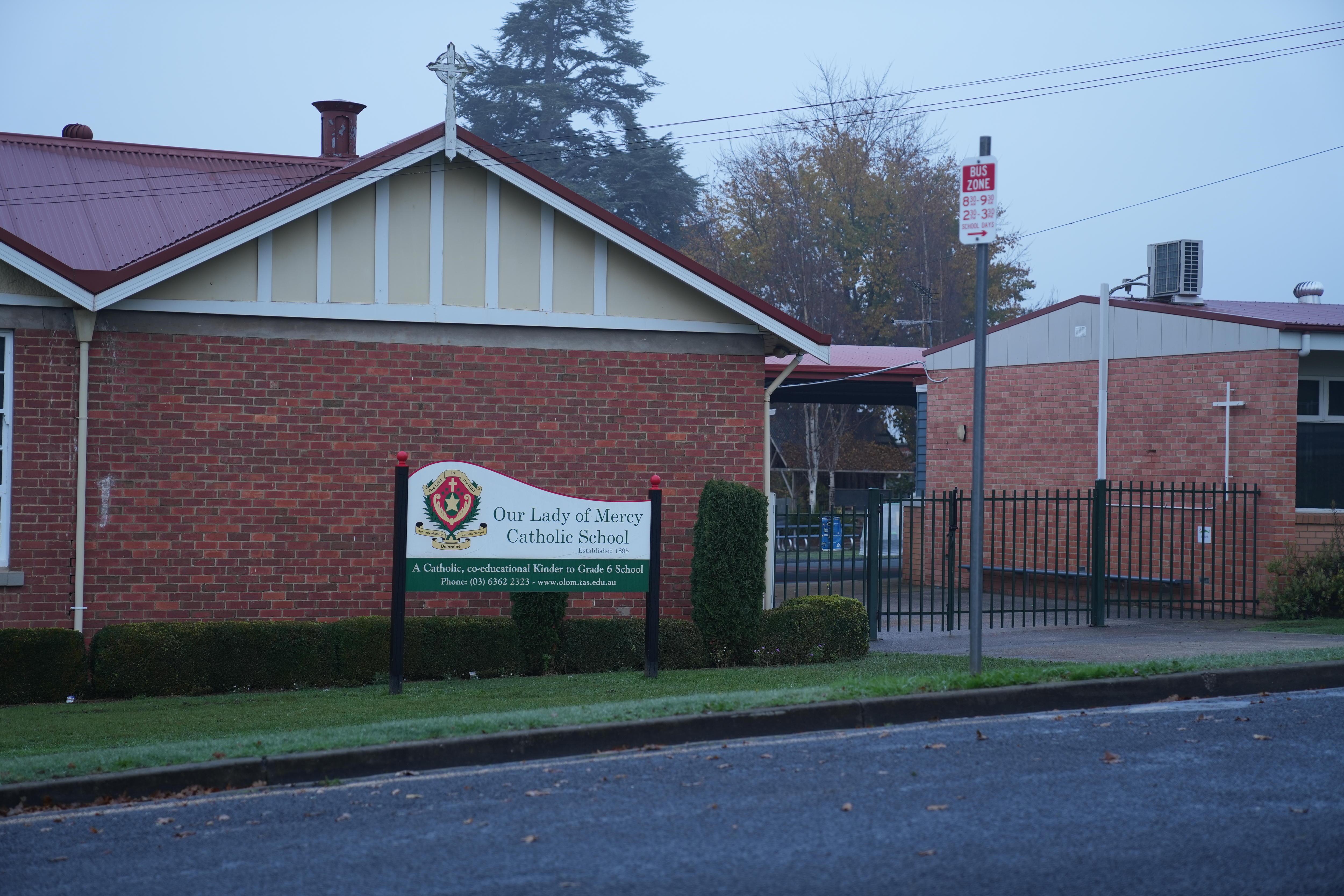 A sign out the front of Our Lady of Mercy Catholic School in Deloraine