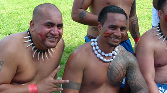 Pacific performers pose for a picture.