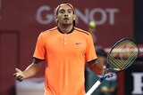 Australia's Nick Kyrgios reacts after getting a point against Gael Monfils of France during the semifinal match of Japan Open tennis championships in Tokyo October 2016