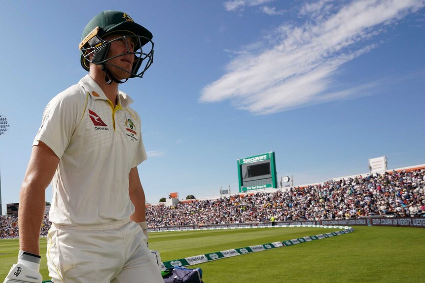 Australia batsman Marnus Labuschagne walks off the field under sunny skies during the Ashes Test at Headingley.