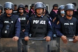 Thai police stand guard