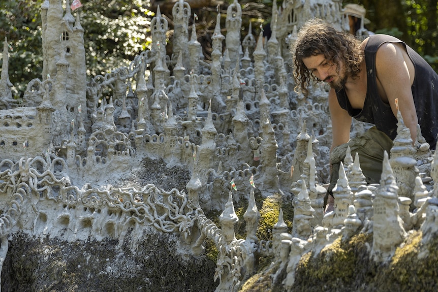 Swiss artist's clay castle built on the dried bed of Le Toleure river in Saubraz