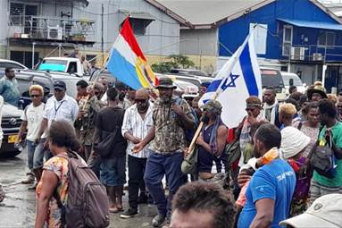 Protesters in Honiara in November 2021 holding the Israeli and Malaitan flags.  