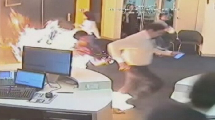 A still of CCTV footage showing the moment Nur Islam allegedly set fire to the Commonwealth Bank at Springvale.