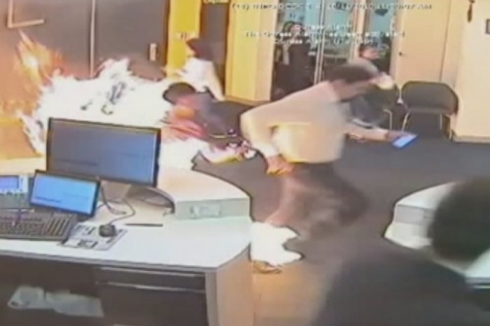 A still of CCTV footage showing the moment Nur Islam allegedly set fire to the Commonwealth Bank at Springvale.