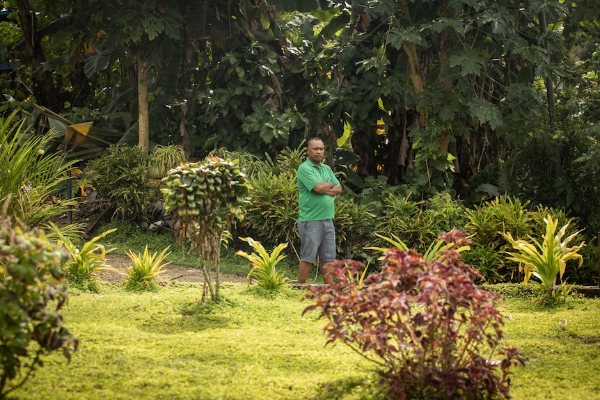 Mr Suidani in a garden