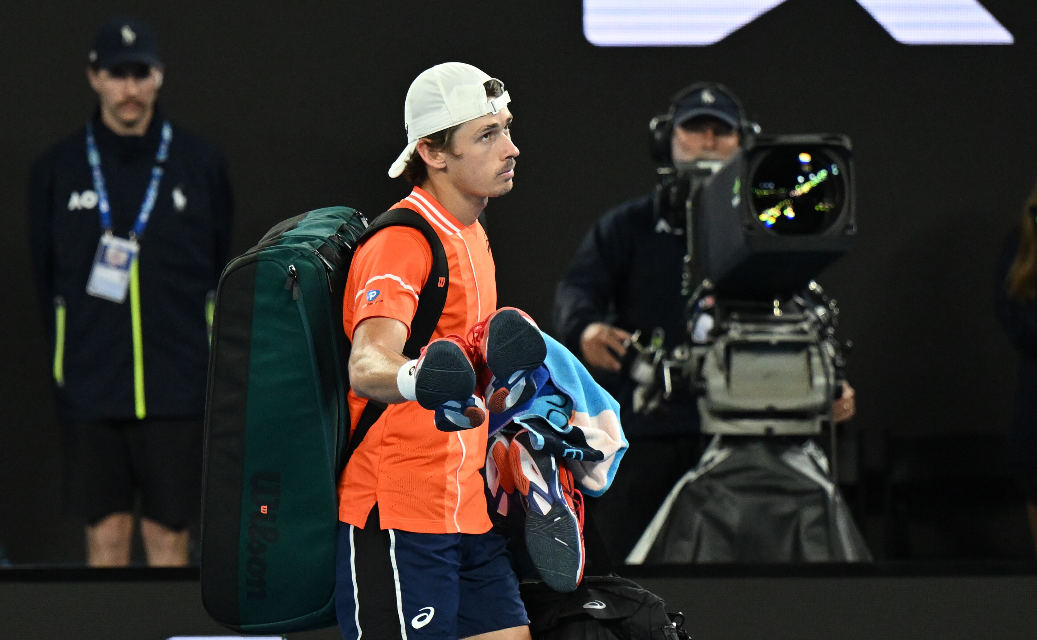 Alex de Minaur walks off Rod Laver Arena at the 2024 Australian Open.