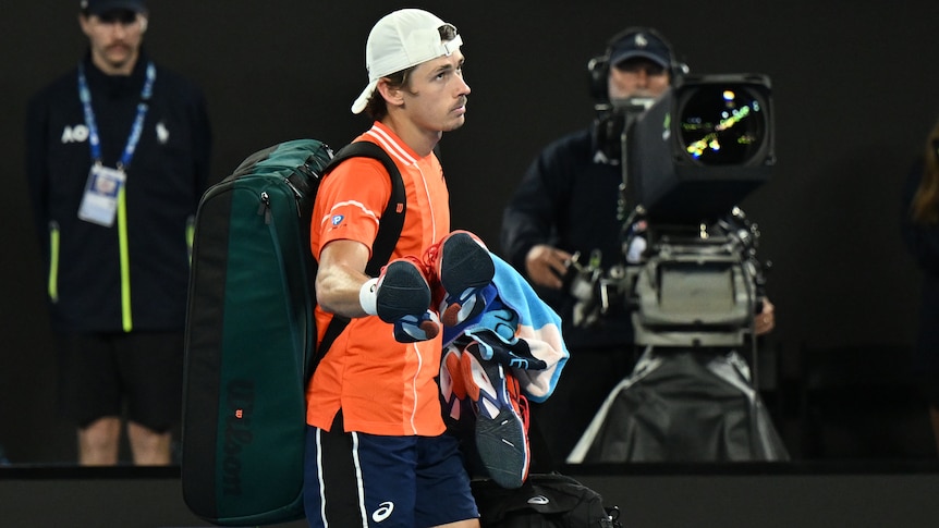 Alex de Minaur walks off Rod Laver Arena at the 2024 Australian Open.