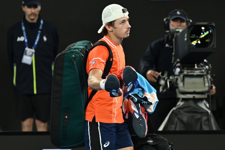 Alex de Minaur walks off Rod Laver Arena at the 2024 Australian Open.