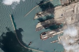A satellite image shows cargo ships leaving from a Syrian port.