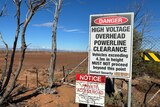 Two signs in the outback 