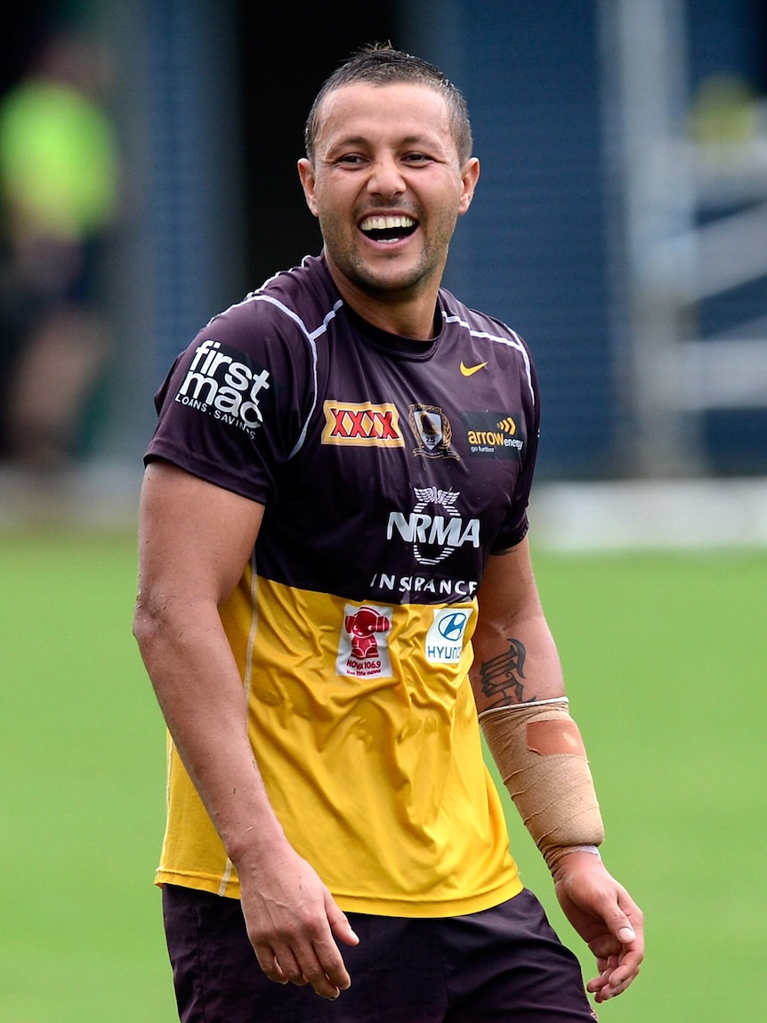 All smiles ... Scott Prince at Broncos' training this week
