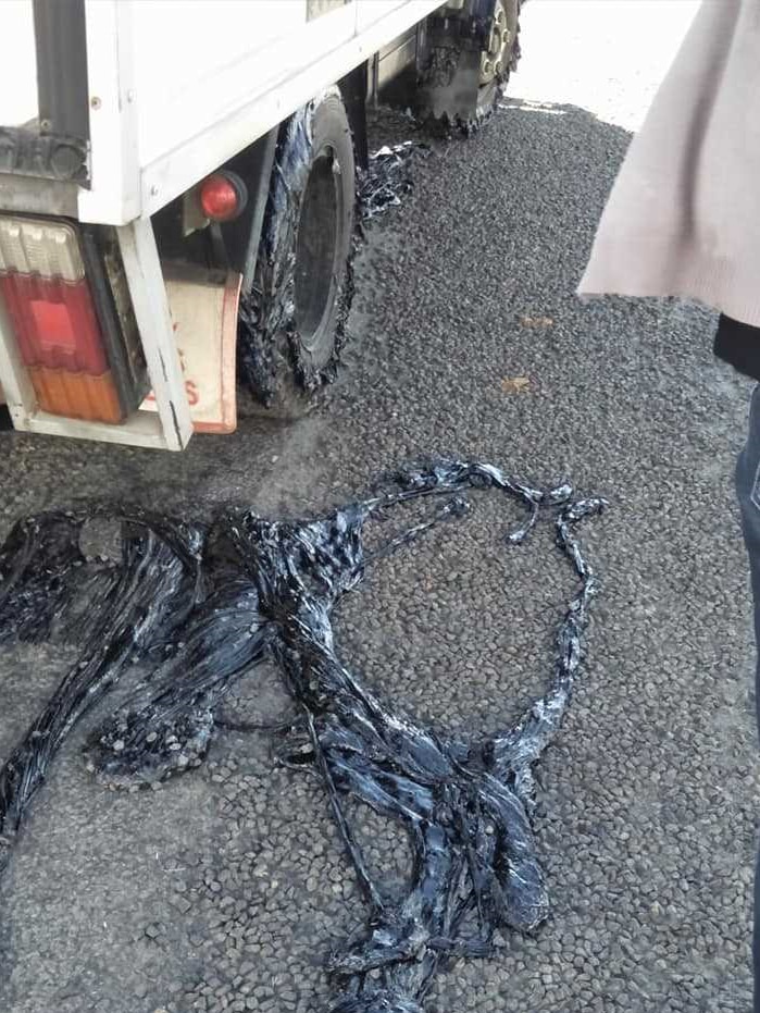 Millaa Millaa road melting bitumen on truck tyres.