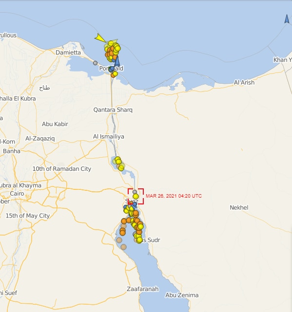 A tracking map of the Suez Canal with coloured dots showing the number of ships waiting to get through 