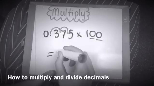 Hand writes numbers on paper, text reads "Multiply" and "how to multiply and divide decimals"