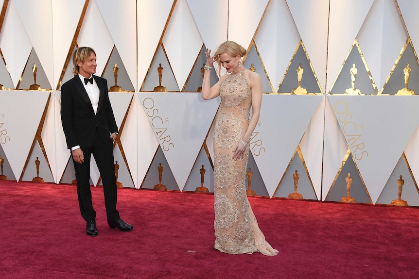 Keith Urban, left, and Nicole Kidman arrive at the Oscars
