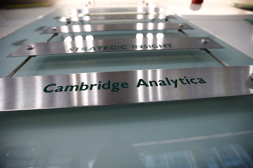 The nameplate of political consultancy, Cambridge Analytica, is seen in an office.