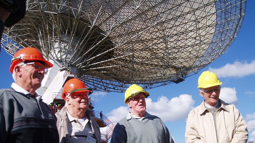 David Cooke (far right) with Ben Lan, Les Fellows and Neil Mason reminisce about at the Parkes dish.