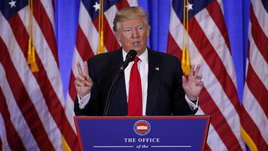 US President-elect Donald Trump speaks during a news conference.