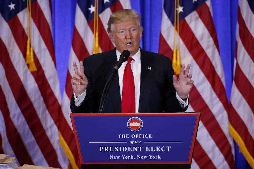 US President-elect Donald Trump speaks during a news conference.