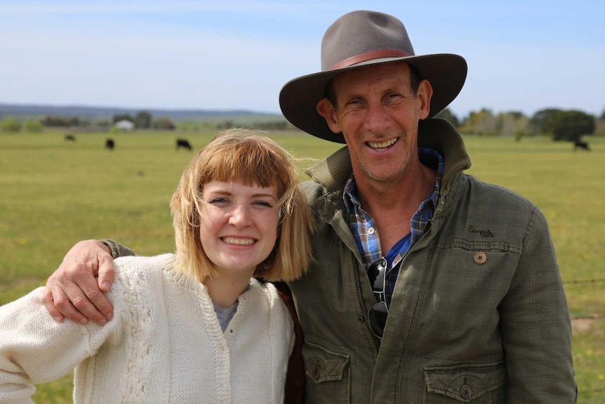 Man in hat and young woman