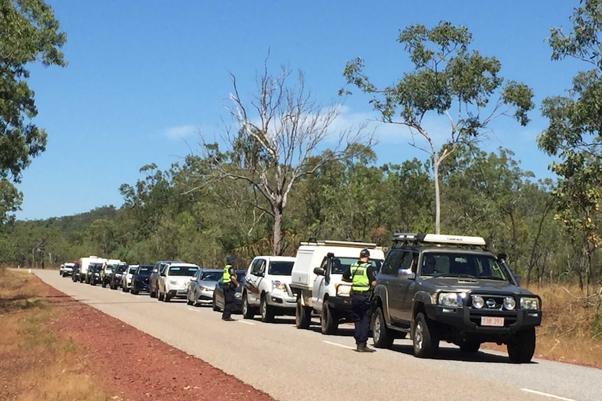 Cars lining up outside Litchfield National Park camping grounds.