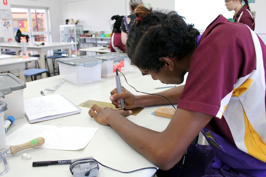 Student working on making a bangle.