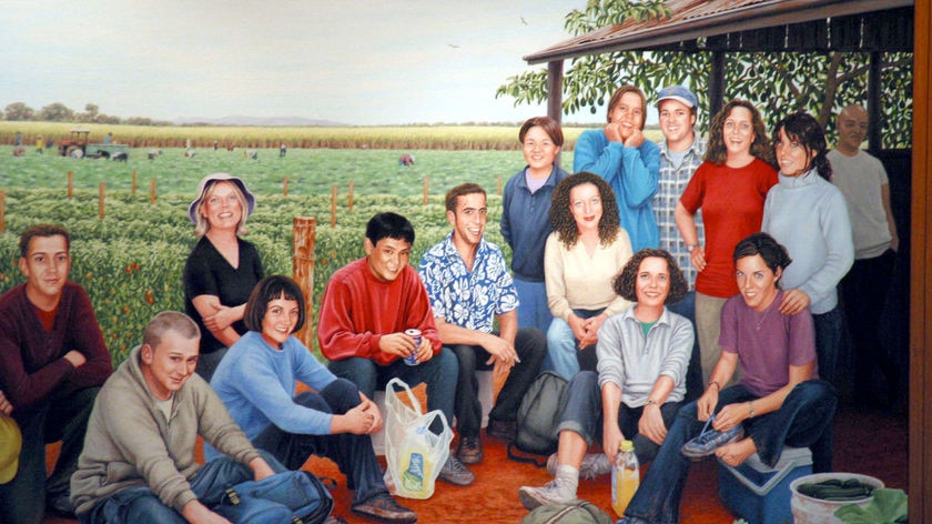 A memorial painting of the 15 backpackers who died hangs in the restored Childers Palace Memorial.