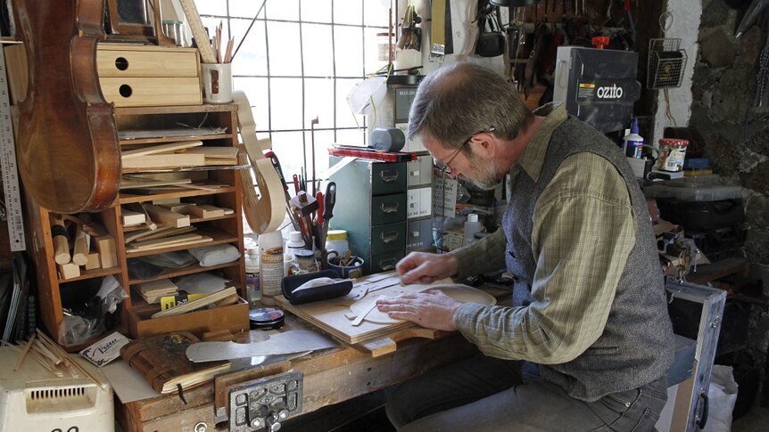 Martin Scuffins making a Hardanger fiddle in his workshop.