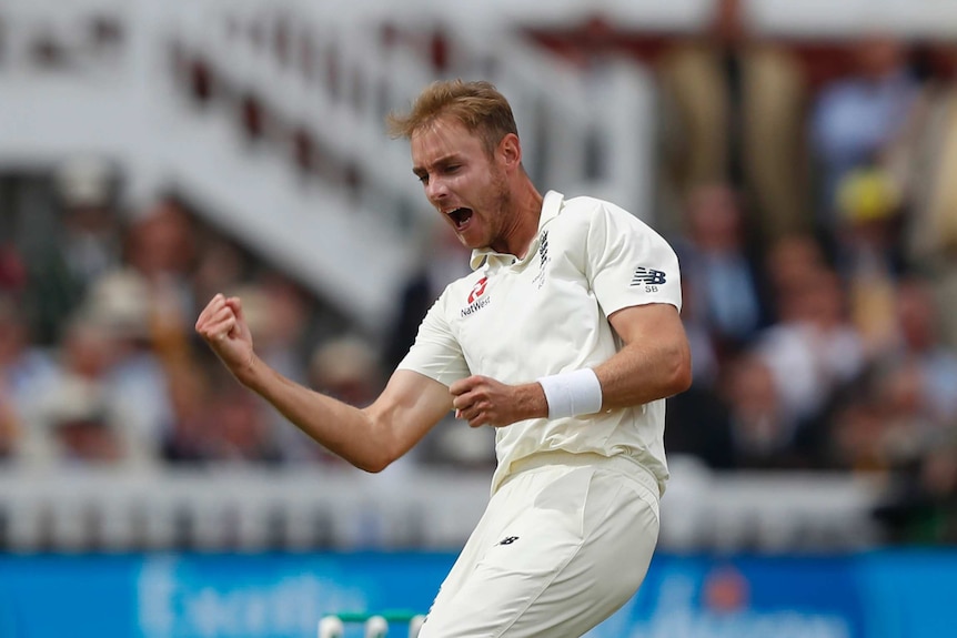 Stuart Broad pumps his fist in celebration of a wicket