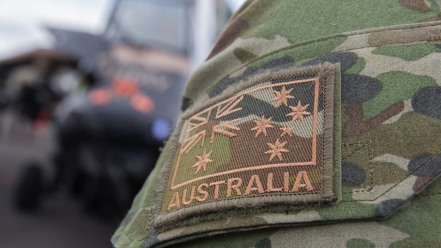 Close up image of flag patch on army uniform