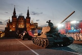 Soviet World War II T-34 tanks drive during VE Day celebrations
