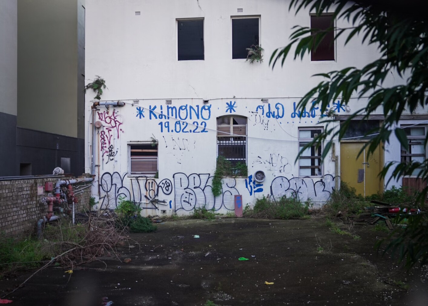 A former hostel sits empty, boarded up and gradually crumbling.