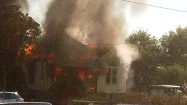 Flames engulf a house at Singleton.