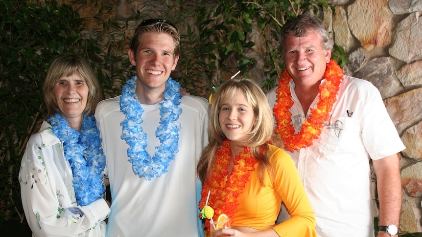 Shelley Beverley and her family wearing leis to celebrate her 21st birthday