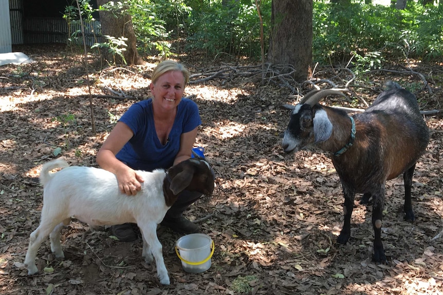 Sam Phelan with two goats