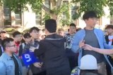 Violent scuffle between pro-China and pro-Hong Kong students erupt at University of Queensland.