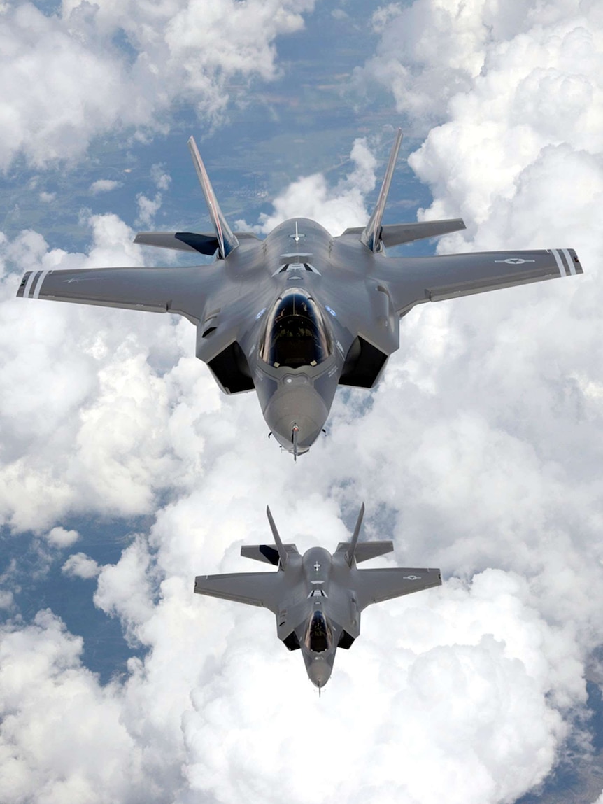 Joint Strike Fighters flying together